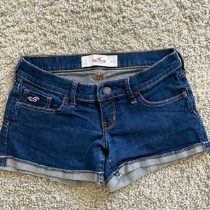 Hollister dark blue denim jean shorts. Low waist 24, size 0. So cute!!